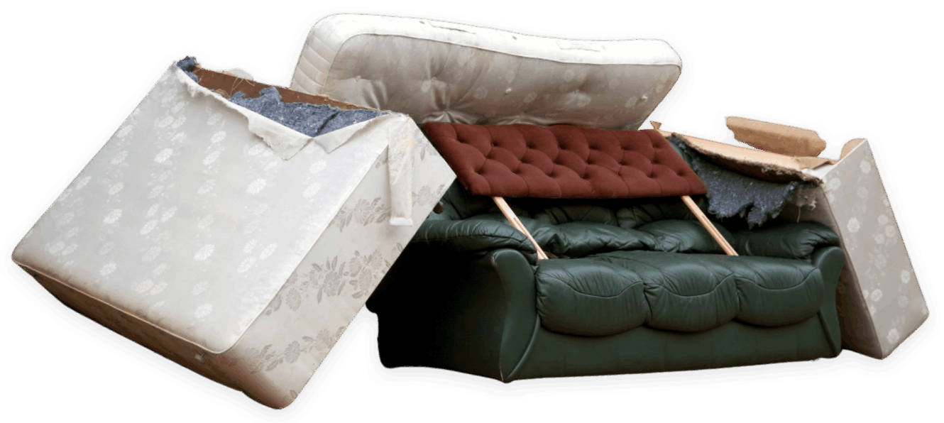pile of mattresses and an old couch